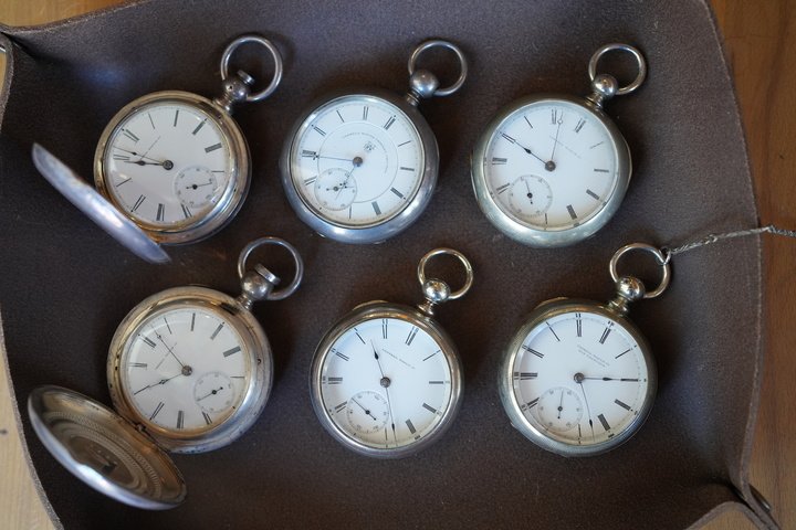 Part of Warren's collection of Cornell pocket watches.