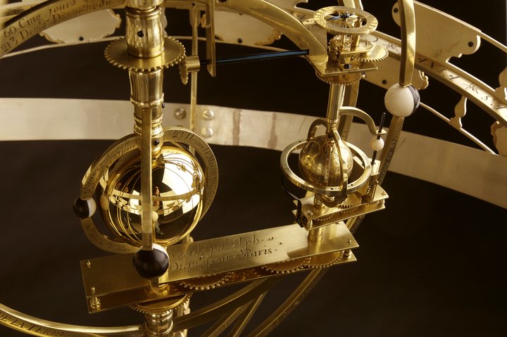 Detail of the clock with moving spheres built by Joseph Dupressoir in Paris around 1794- 1795. It shows duodecimal time, the phases and age of the moon, decimal time (the time system of the French Revolution) the full calendar and world time.