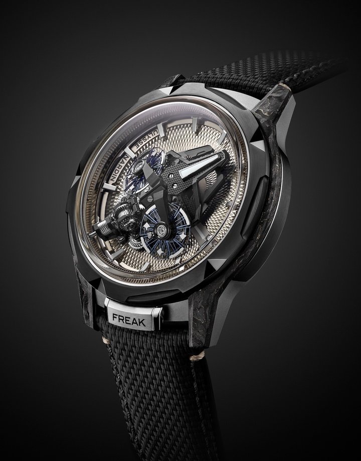 The Ulysse Nardin Freak S Nomad (2024) is the latest Freak to date. Housed inside a 45mm titanium case, the in-line movement's two inclined escapements, linked by a differential system, form a futuristic architecture evocative of Star Wars or Star Trek, while the hand-executed sand-coloured diamond guilloché pattern is pure tradition.