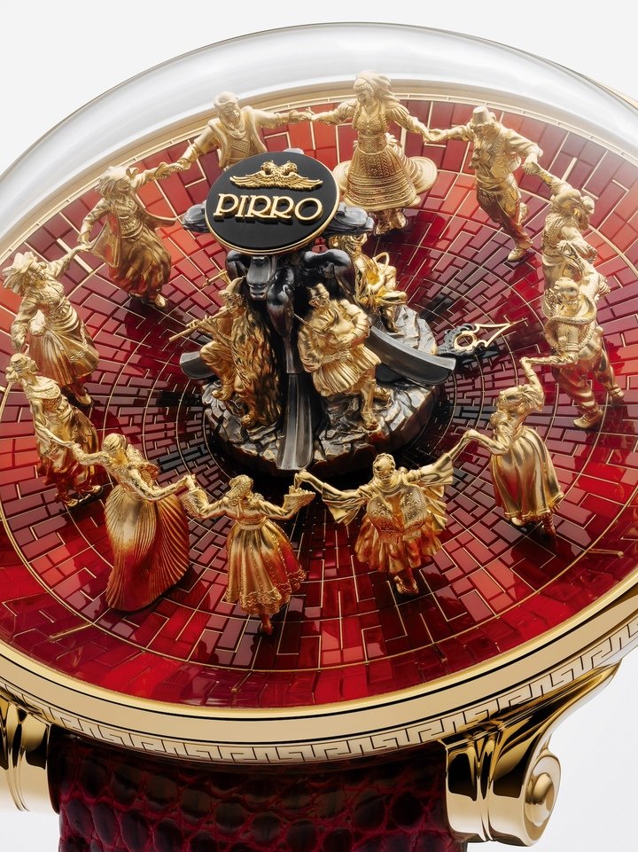 Primordial Passion's dial. Hand-sculpted in 18k gold, the figurines measure 10mm high and wear traditional Albanian regional dress.