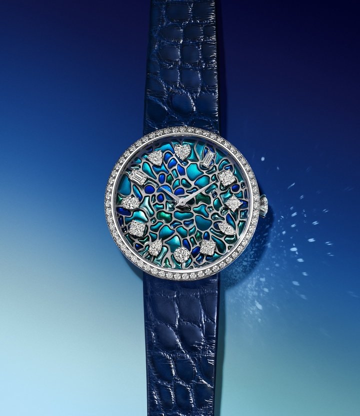 The Eternity by Tiffany Wisteria watch is inspired by the emblematic Tiffany & Co. lamps of the early 1900s, with an enamel plique-à-jour dial in bright colours reproducing the floral pattern.