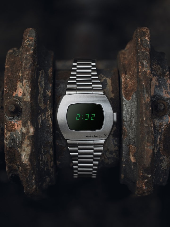 The world's first digital watch features a new green LCD & OLED hybrid display in a 41mm stainless steel case.