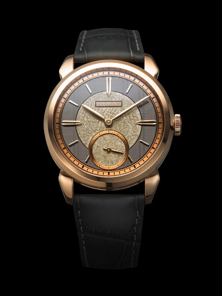 Rose gold, limited to 7 pieces, creates a textural interplay of a carbon grey guilloché outer track with a hammered champagne centre and subdial.