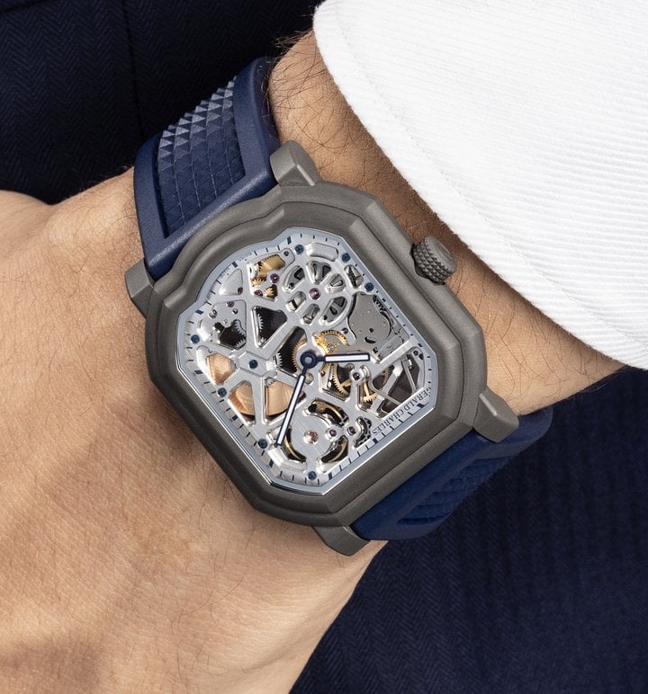The Maestro 8.0 GC Sport Squelette in Grade 5 Titanium, with Royal Blue vulcanised rubber strap, is the Maison's first-ever automatic skeleton timepiece with the screw-down crown on the left .